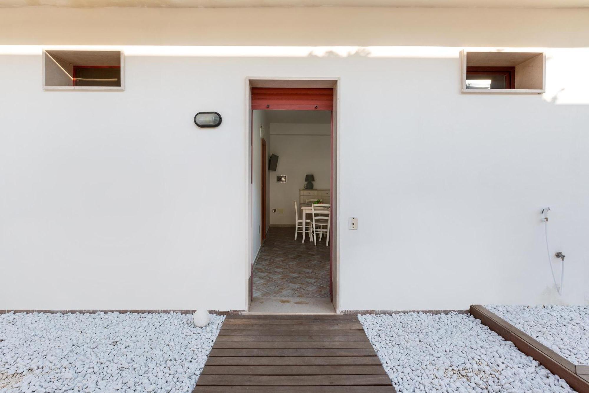 Joy Home Apartments Maruggio Camera foto