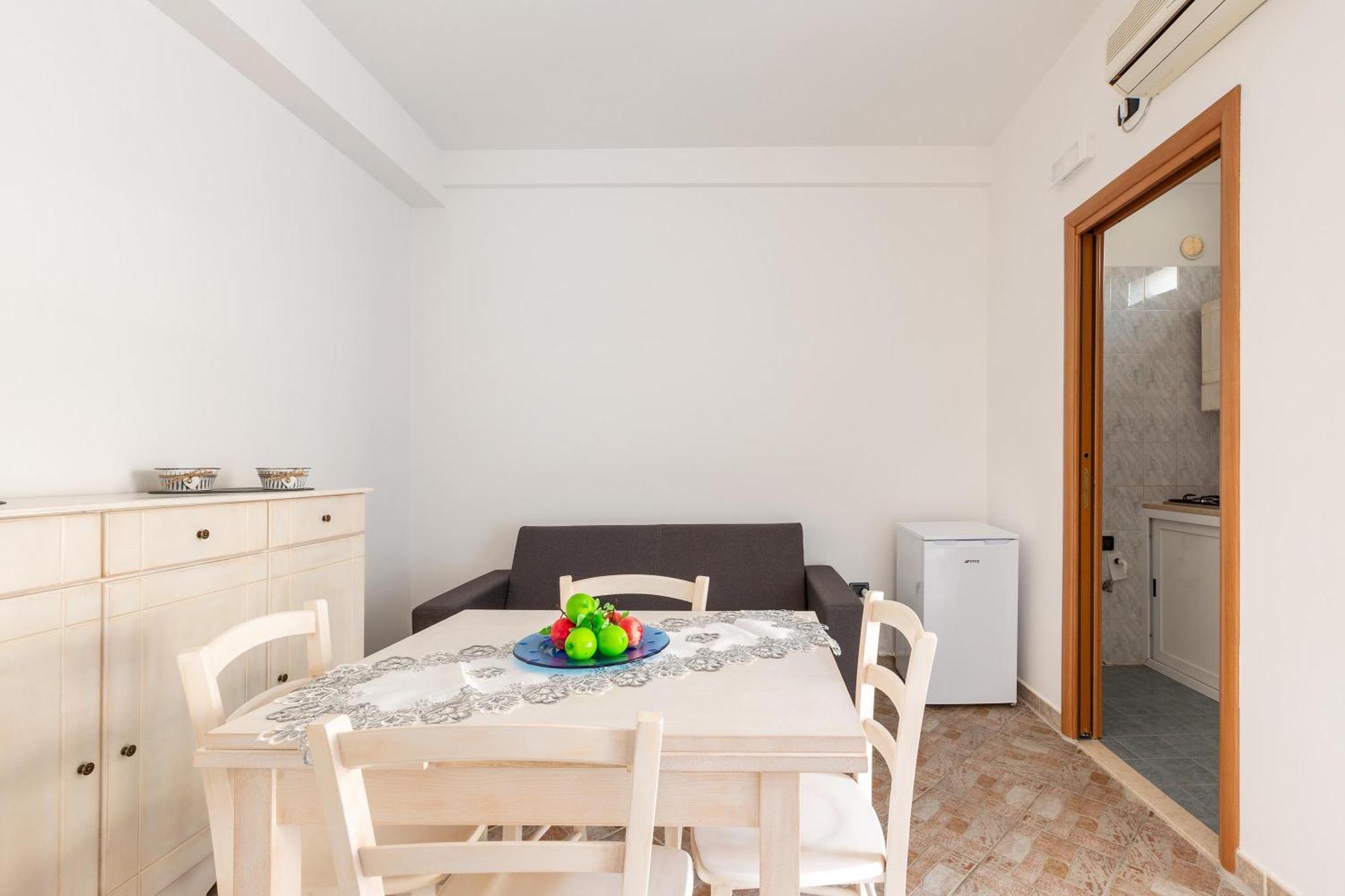 Joy Home Apartments Maruggio Camera foto